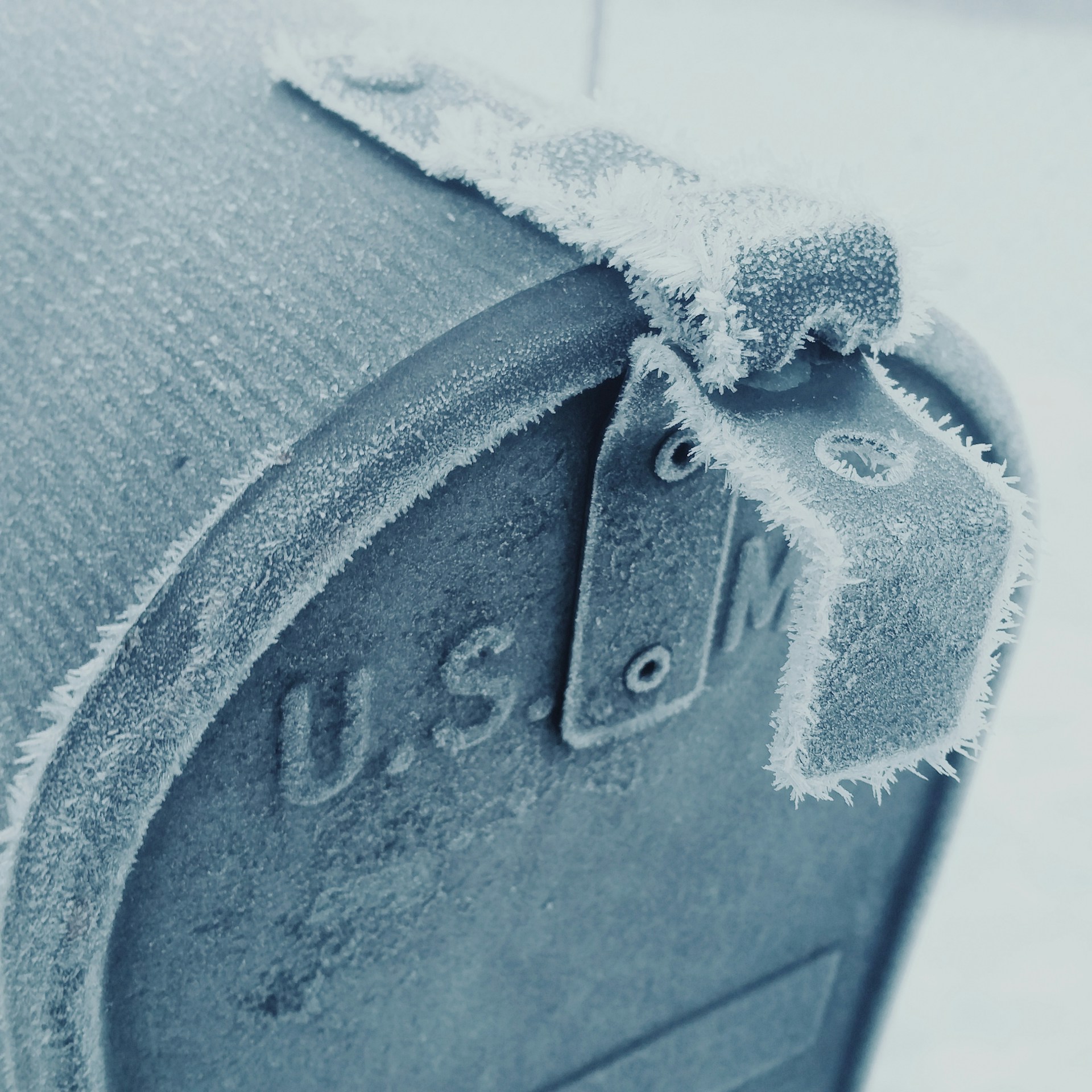 mailbox with ice - image by rebecca-hansen - unsplash